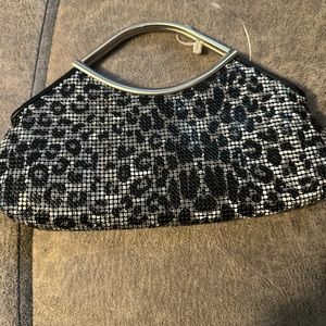 Leopard clutch, metal chain mail, cute and fun.  never used! Beautiful inside.
